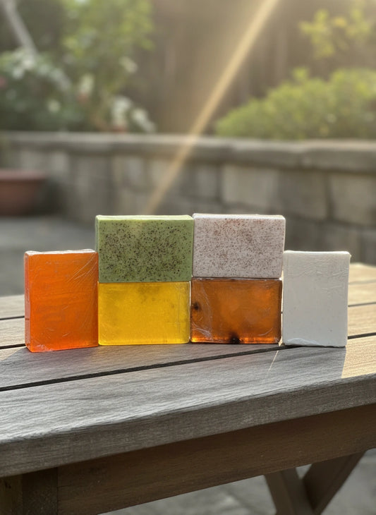 Urban Tree Organic Soap assortment on wooden table – natural organic handmade soaps for skincare in Pakistan