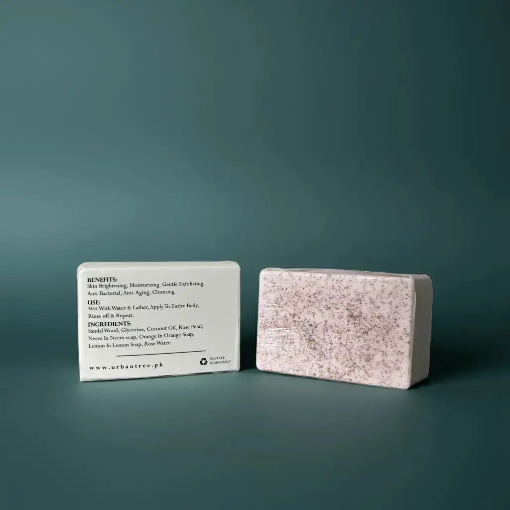 Urban Tree Acne Rescue Soap with back packaging showing ingredients and benefits on green background
