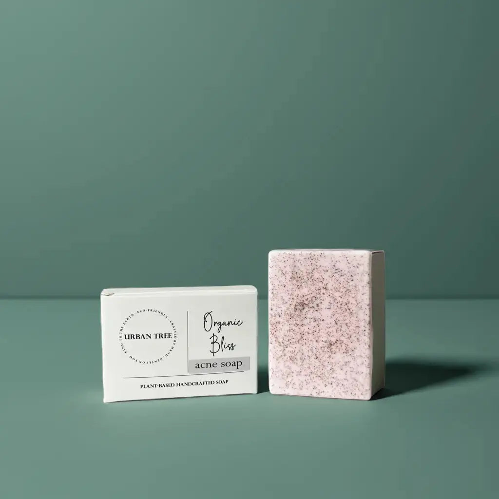 Urban Tree Acne Rescue Soap with packaging box front view on green background