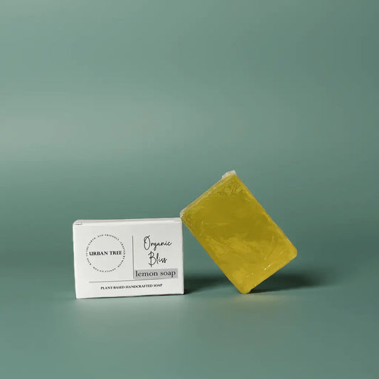Urban Tree Lemon Citrus Soap with packaging box front view on green background