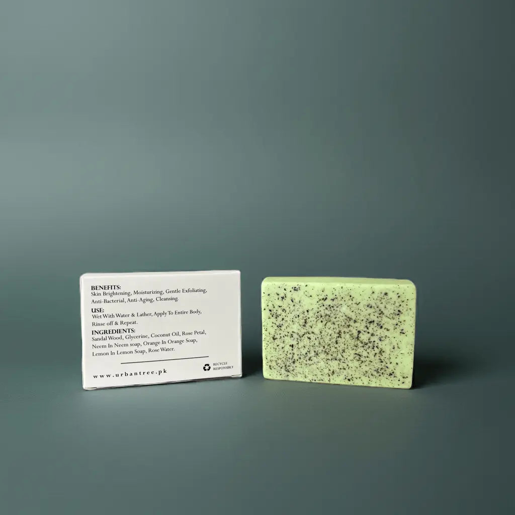 Urban Tree Neem Soap with back packaging showing ingredients and benefits on green background