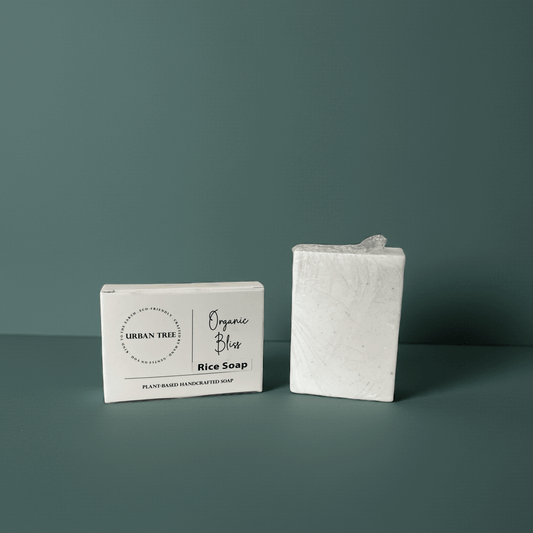 Urban Tree Rice Radiance Soap with packaging box front view on green background