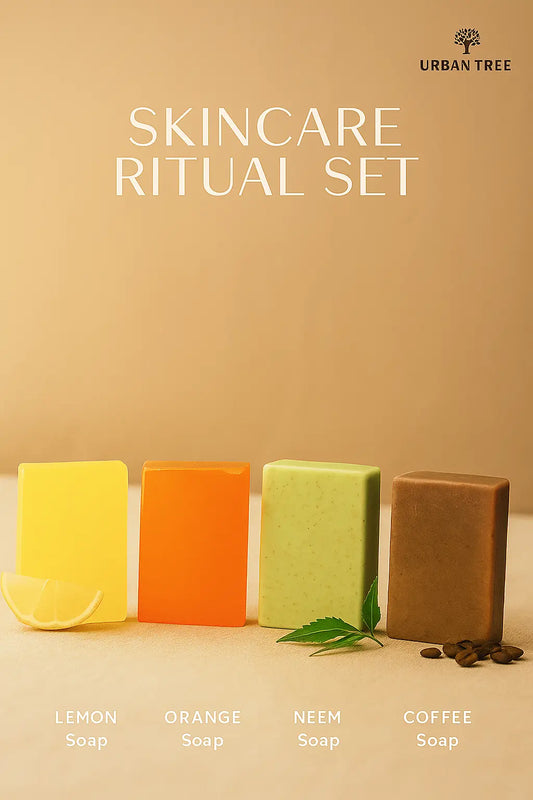 Urban Tree Skincare Ritual Set with Lemon, Orange, Neem, and Coffee soaps arranged on beige background