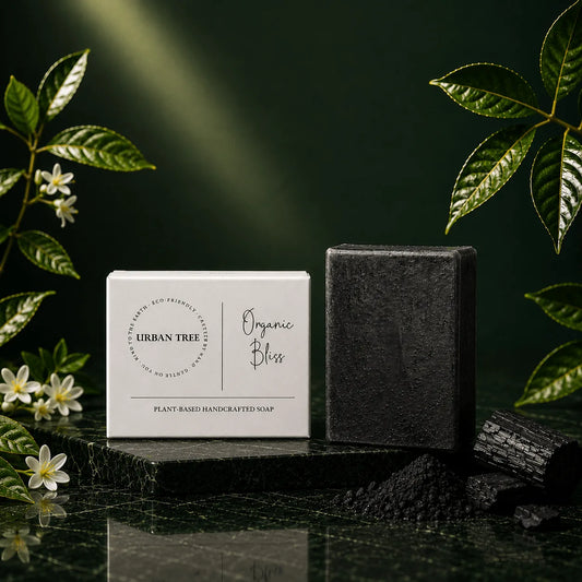 Charcoal Soap handmade detox soap 100g by Urban Tree Pakistan with black charcoal soap bar, charcoal pieces and premium botanical background