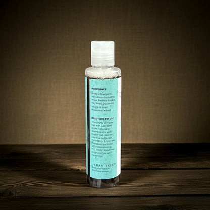 Organic Shampoo ingredients label of Urban Tree showing natural components like amla, reetha, flax seed, castor oil, and rosemary extract.