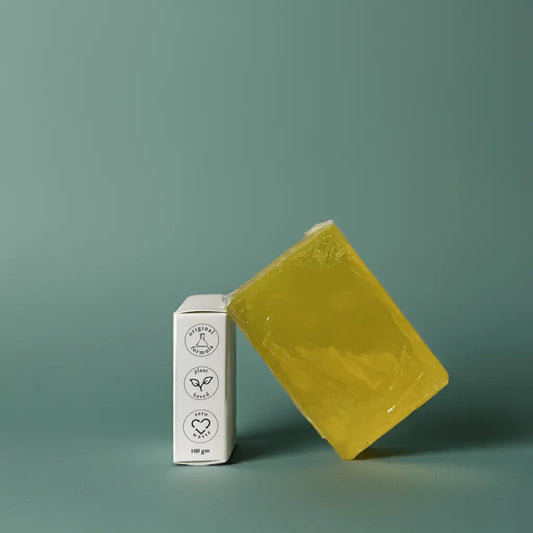 Urban Tree Lemon Citrus Soap with side packaging showing eco friendly and vegan icons on green background