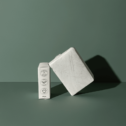 Urban Tree Rice Radiance Soap with side packaging showing eco friendly and vegan icons on green background