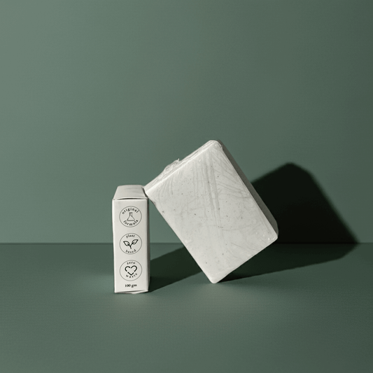 Urban Tree Rice Radiance Soap with side packaging showing eco friendly and vegan icons on green background